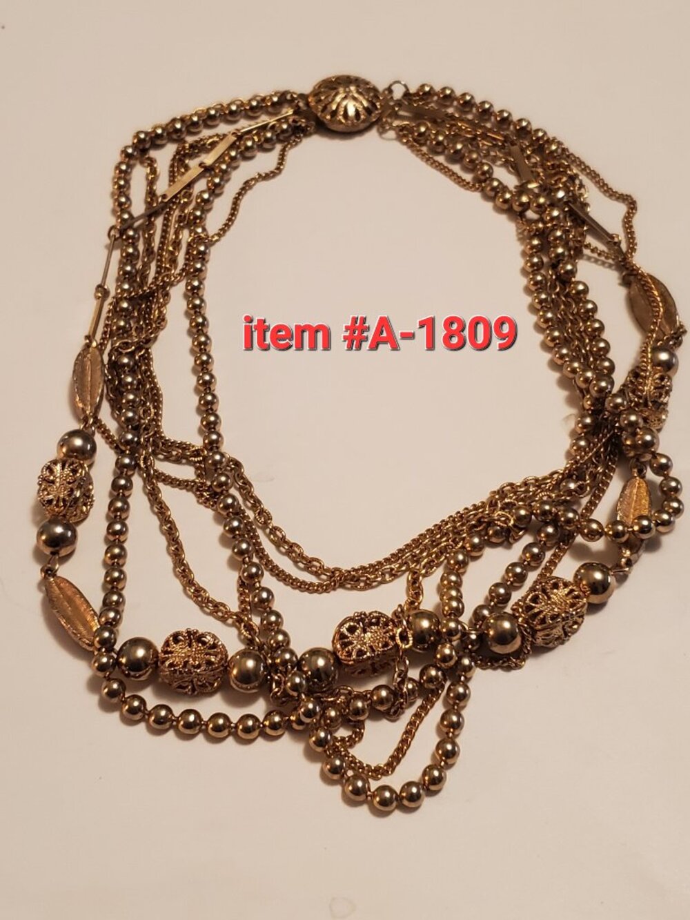 7 Gold Chain Linked Necklaces, item # A- 1809, wt. 91 grams.